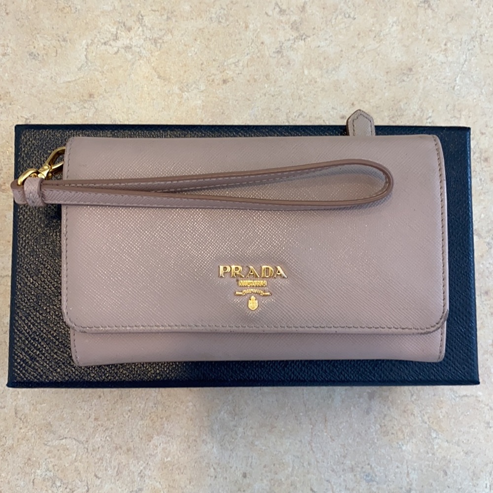 Prada used wallet with the strap